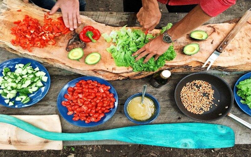 Close-up of chefs preparing food